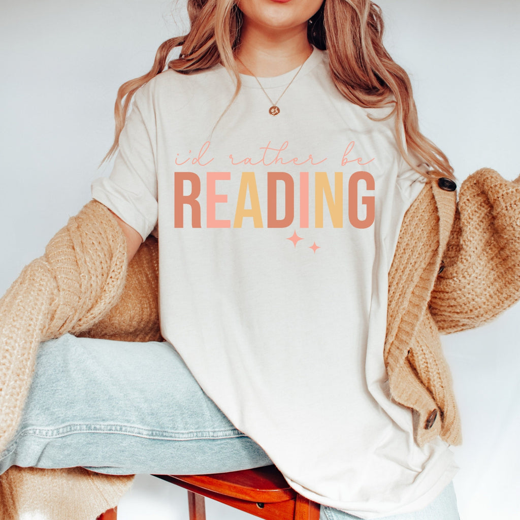 Women's "I'd Rather Be Reading" Unisex Fit Jersey Short Sleeve Tee, Funny Reading T-Shirt, Gift For Book Nerd, Bookworm Tee, Book Lover
