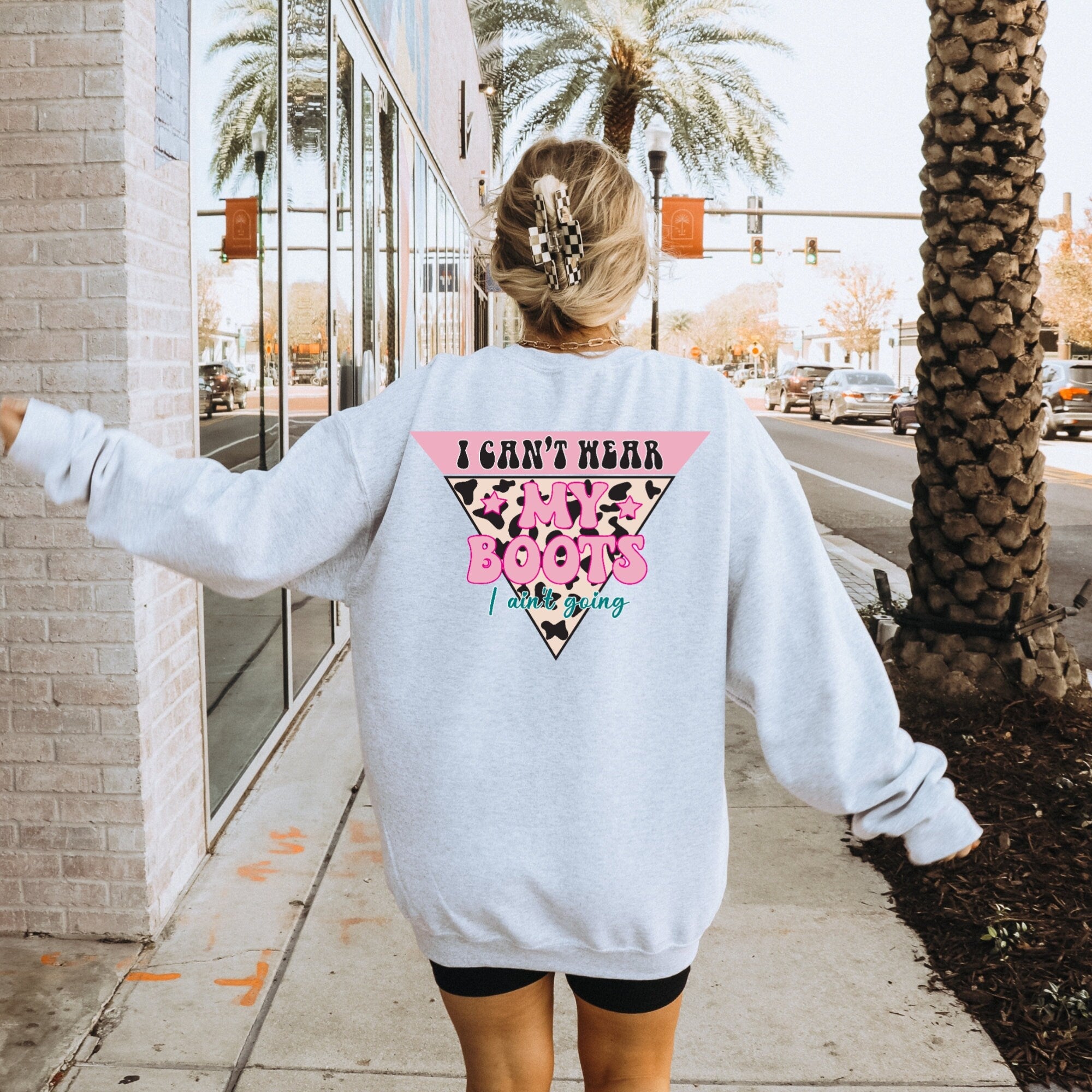 Women's "I Can't Wear My Boots I Ain't Going" Unisex Fit Heavy Blend Crewneck Sweatshirt In The Color Ash, Cowgirl Sweater, Back Logo
