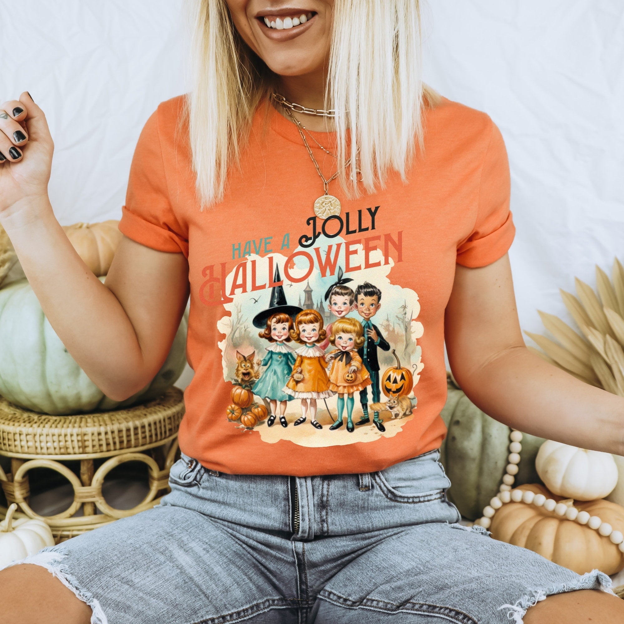 Women's "Have A Jolly Halloween" Vintage Halloween Unisex Fit Jersey Short Sleeve Tee In The Color Heather Orange, Halloween Shirt, T-Shirt