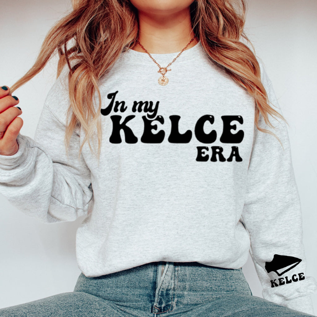 Women's "In My Kelce Era" On The Front "Kelce" On The Right Sleeve, Unisex Fit Heavy Blend™ Crewneck Sweatshirt In The Color Ash, T Swift