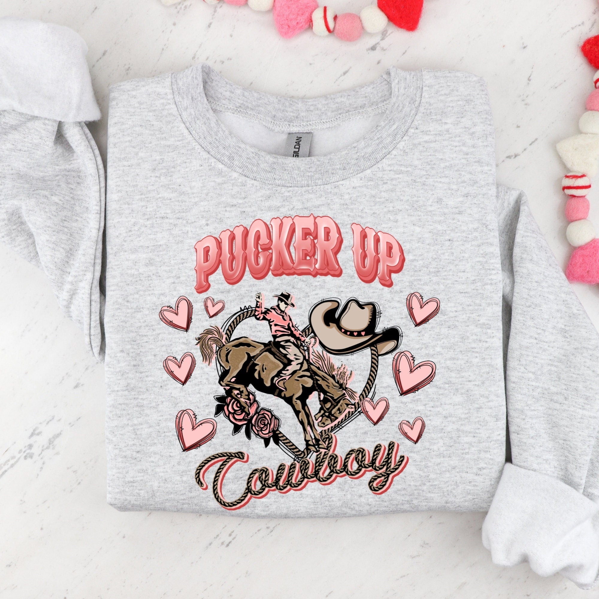 Women's "Pucker Up Cowboy" Unisex Fit Heavy Blend™ Crewneck Sweatshirt In The Color Ash, Valentine's Day Sweater, Western