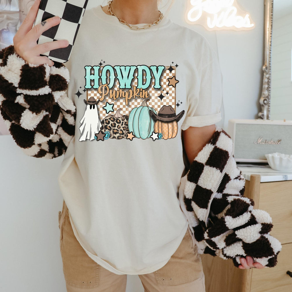 Women's Western Halloween "Howdy Pumpkin" Retro Fall Design Unisex Fit Garment-Dyed T-shirt In The Color Ivory