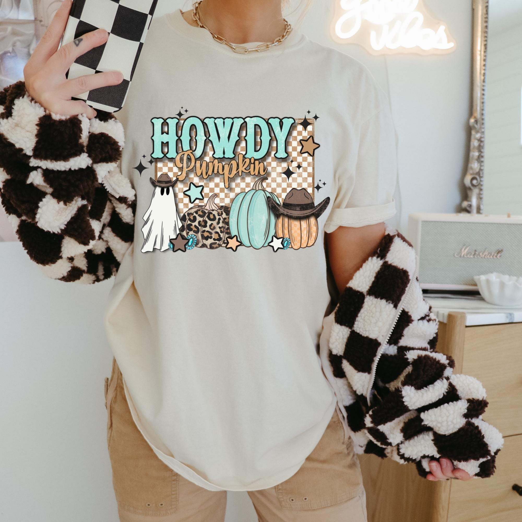 Women's Western Halloween "Howdy Pumpkin" Retro Fall Design Unisex Fit Garment-Dyed T-shirt In The Color Ivory